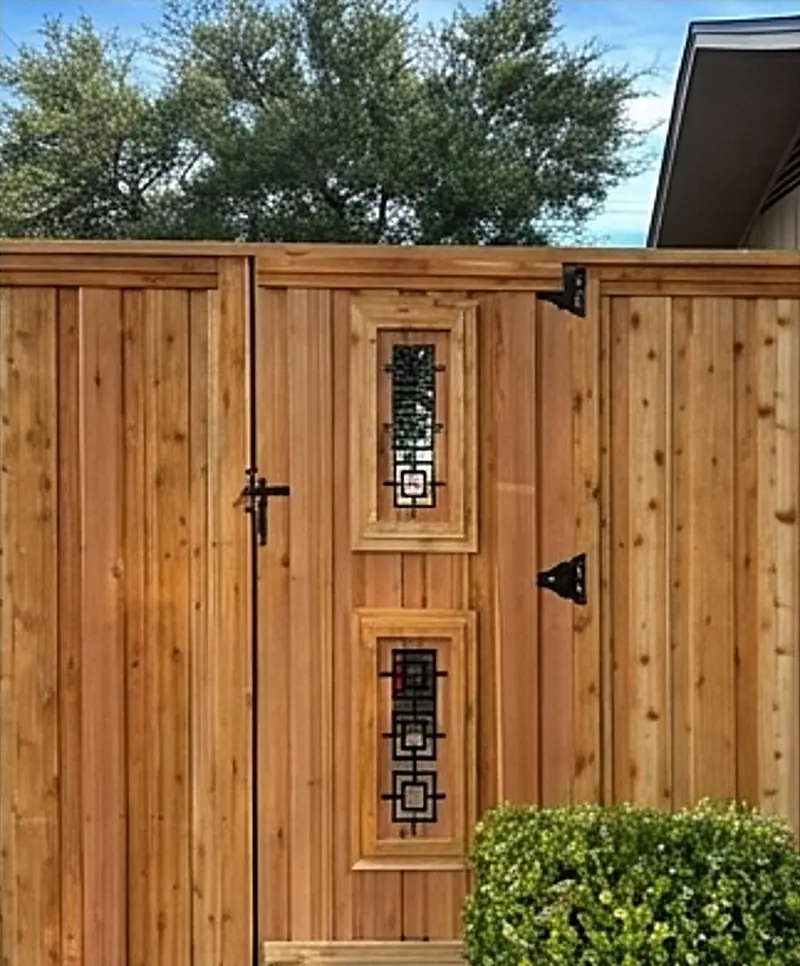 Ironwork custom gate, built to match the fence
